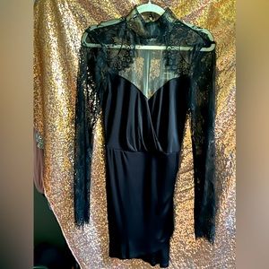 Black mini dress with button up lace neck by Michael Costello for Revolve